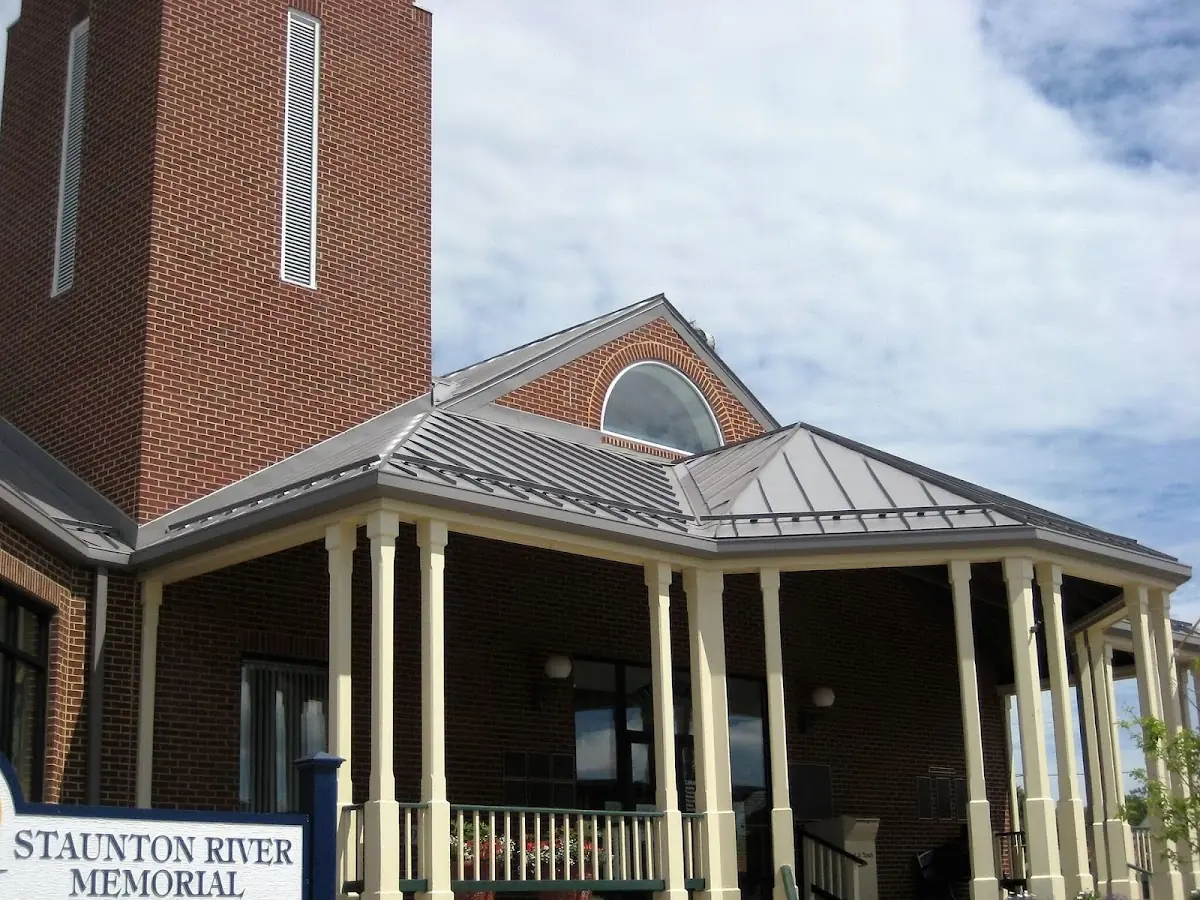 Skilled roofing craftsmen working on a residential roof in Egg Harbor
